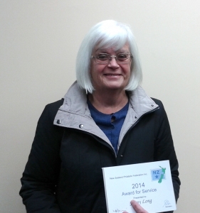 Jenny Long with her award presented by Karen Jeffrey, South Island federation delegate at the July postcard meeting of the Christchurch Philatelic Society