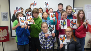 The campers at the Polish Heritage Trust Museum with their wycinanki creations, a Polish paper cutting traditition.