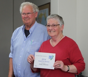 Sandy receiving her Award for Service from Robert Livingstone, long-time Northern Region delegate for NZPF, at Ambury Shield, Hamilton.