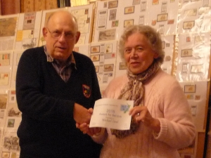 Mike being presented with his award by Barbara Streeter.