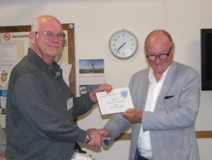 John Mowbray receiving his award from Bob Gibson, secretary for Federation.