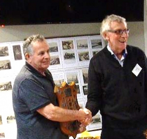 Bruce Tapp, President Waikato receives the Ambury Shield from Ross Haycock.